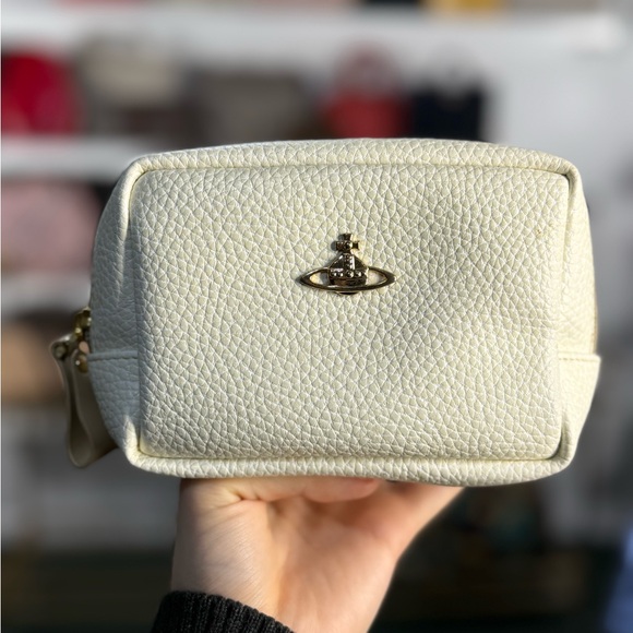 Vivienne Westwood Handbags - Vivienne Westwood Cream Pebbled Leather Cosmetic Case with Gold Orb